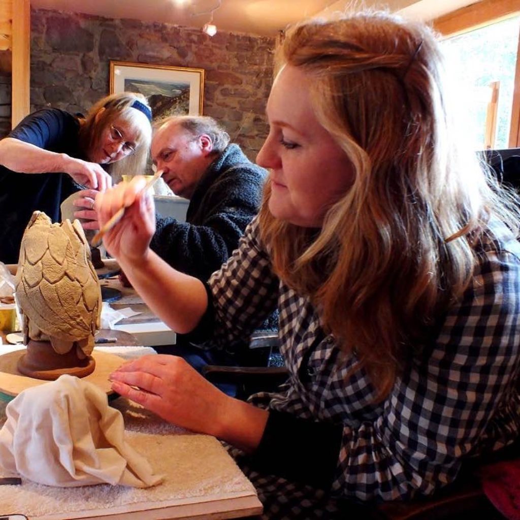 Making a clay owl in this instance pottery workshop with Carole